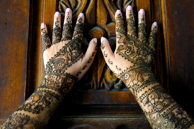 Cross cultural weddings Bridal henna wedding photographer Sarasota wedding photographer Henna hands for wedding